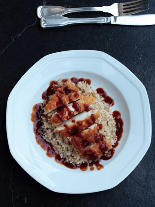 Easy crispy chicken katsu on a white plate from above