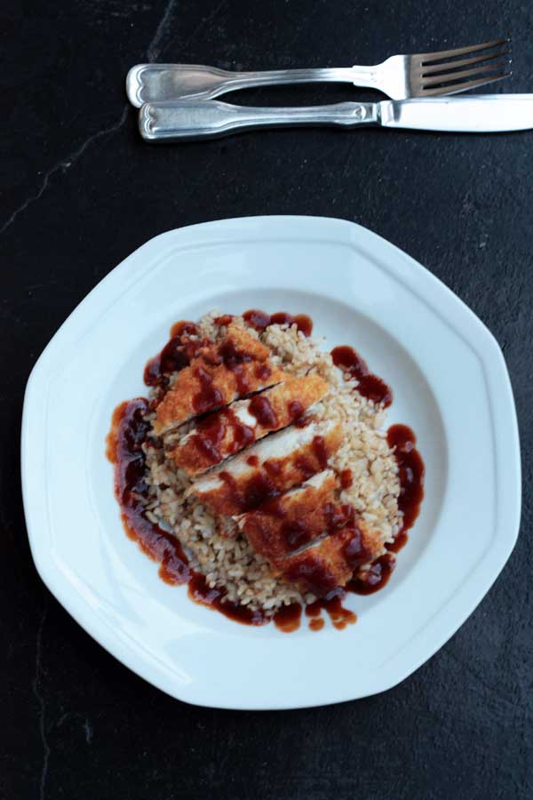 Easy crispy chicken katsu on a white plate from above