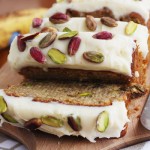 Slices of banana pistachio cake sliced off the rest of the cake