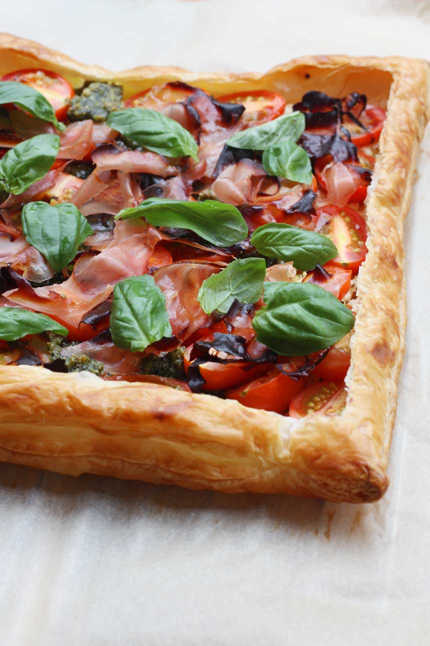 Baby tomato, pesto & prosciutto tart