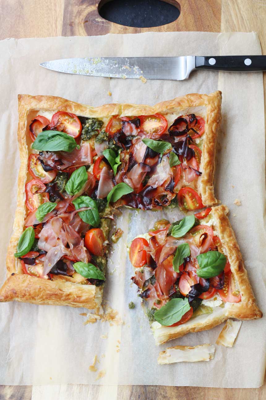 Baby tomato, pesto & prosciutto tart