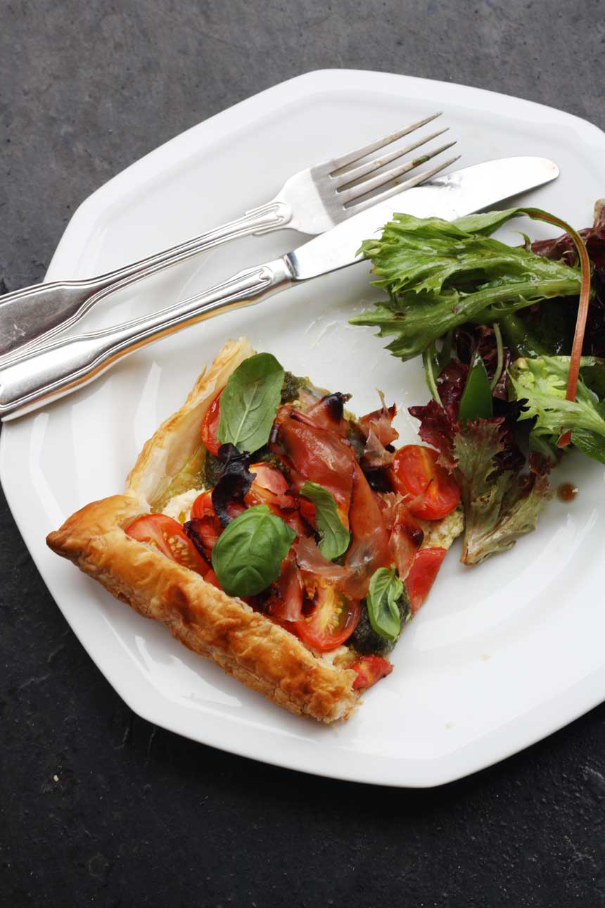 Baby tomato, pesto & prosciutto tart