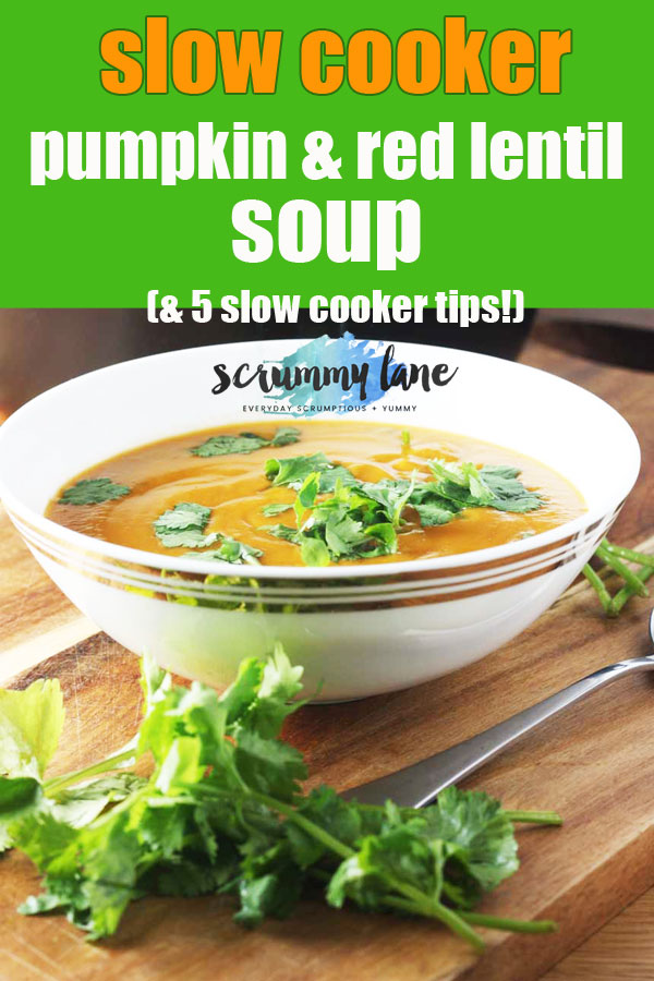 A bowl of pumpkin and red lentil soup sprinkled with fresh coriander