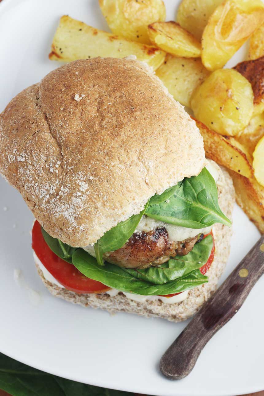 Bacon-wrapped turkey burgers with Gruyère cheese