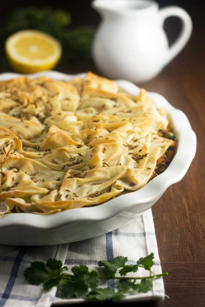 Samosa pie with a scrunched filo pastry top