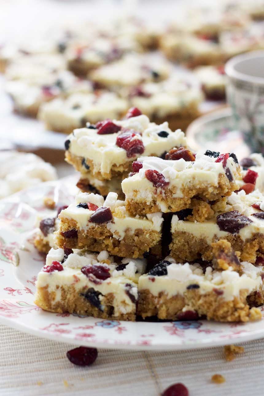 A pyramid of white chocolate tiffin on a patterned plate