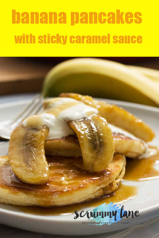 A plate of fluffy pancakes with bananas and caramel sauce on top