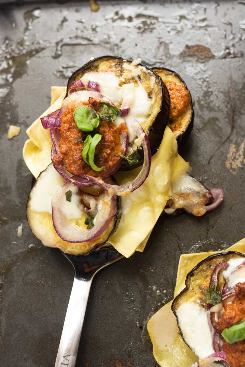 Freestyle eggplant lasagna on a black baking tray from above.