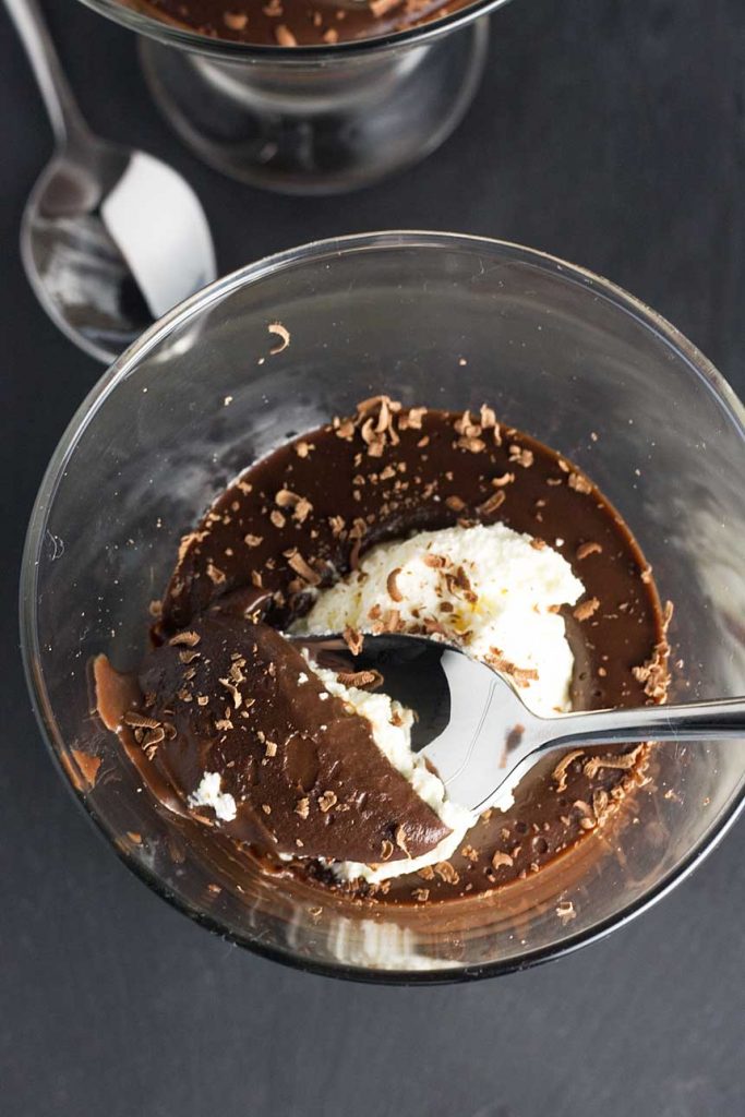 overhead shot of a chocolate pot with cream on top