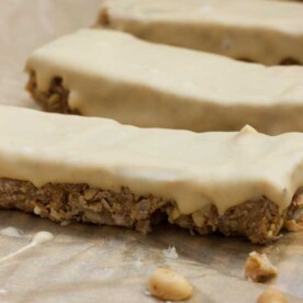 sweet and salty peanut butter granola bars on a piece of baking paper