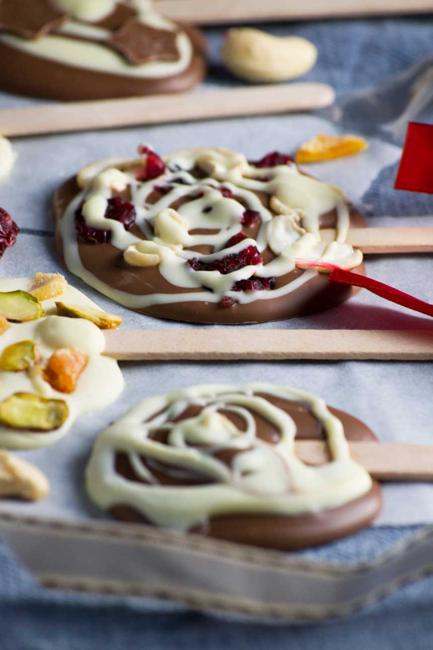 Closeup of Chocolate lollipops on baking paper