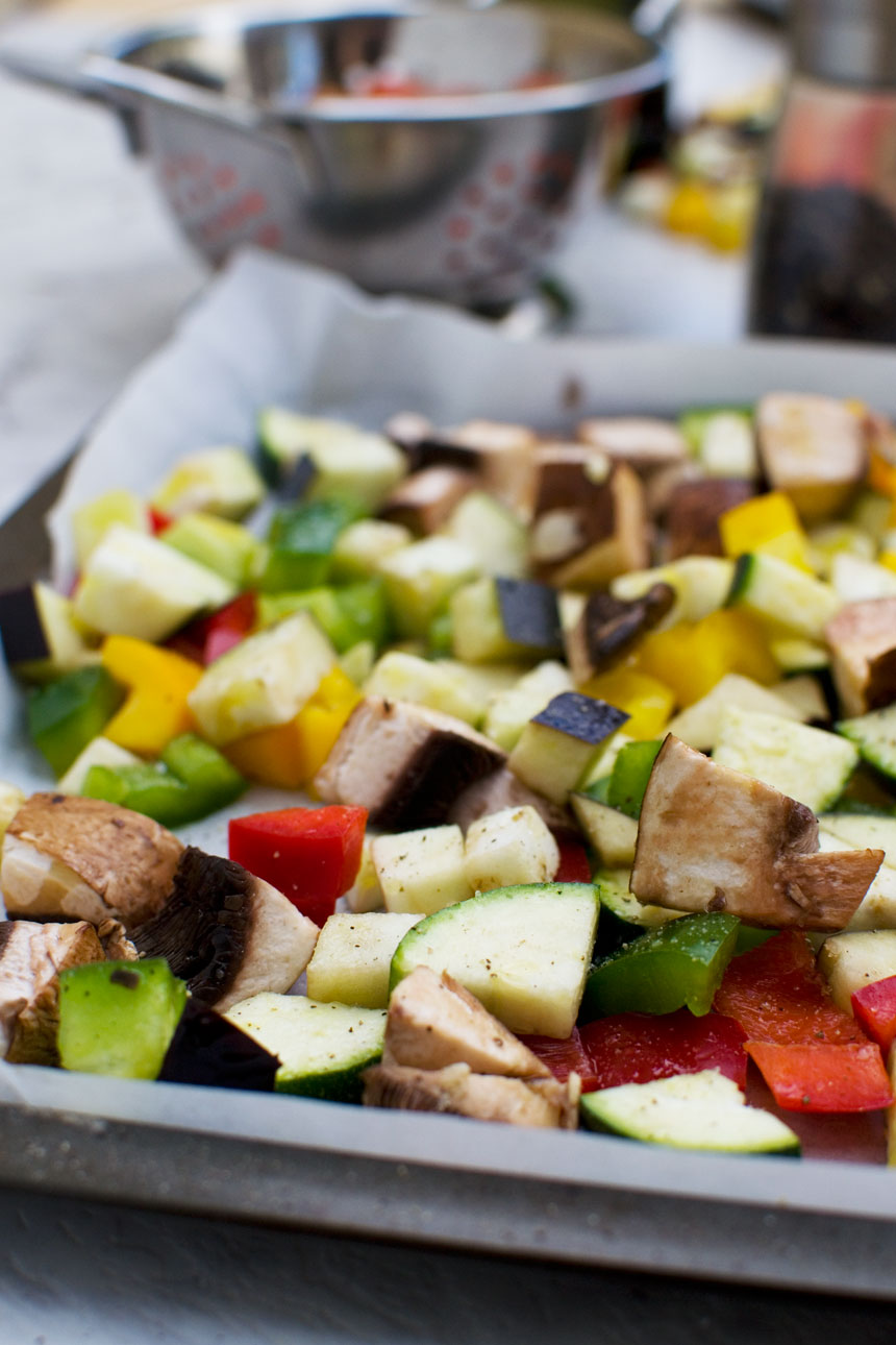 Mediterranean vegetables raw on a baking tray ready to be cooked