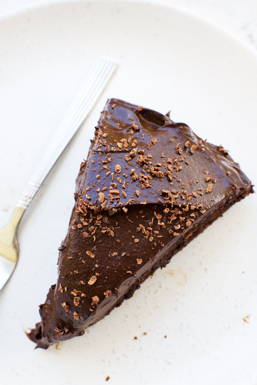 Slice of 30 minute healthy chocolate cake on a plate with a fork from above