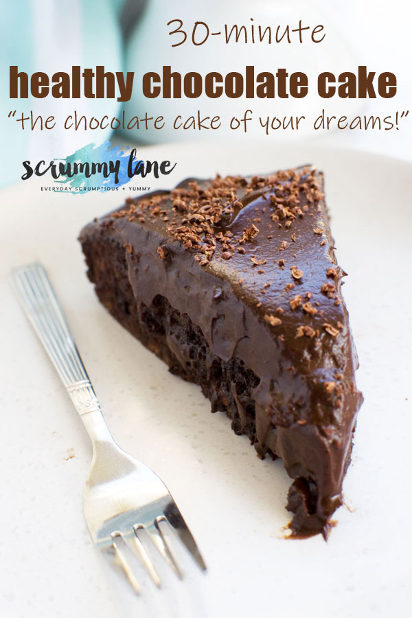a slice of healthy chocolate cake on a white plate with a fork