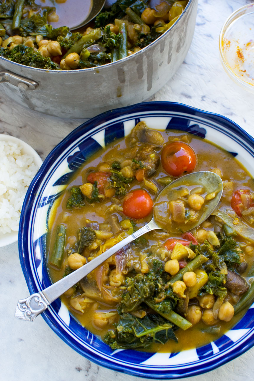 A 20-minute coconut chickpea curry with a spoon in it from above