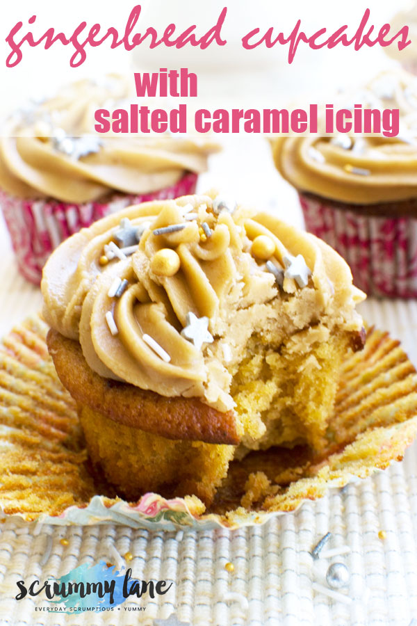 A gingerbread muffin with salted caramel icing with a bite out of it for Pitnerest