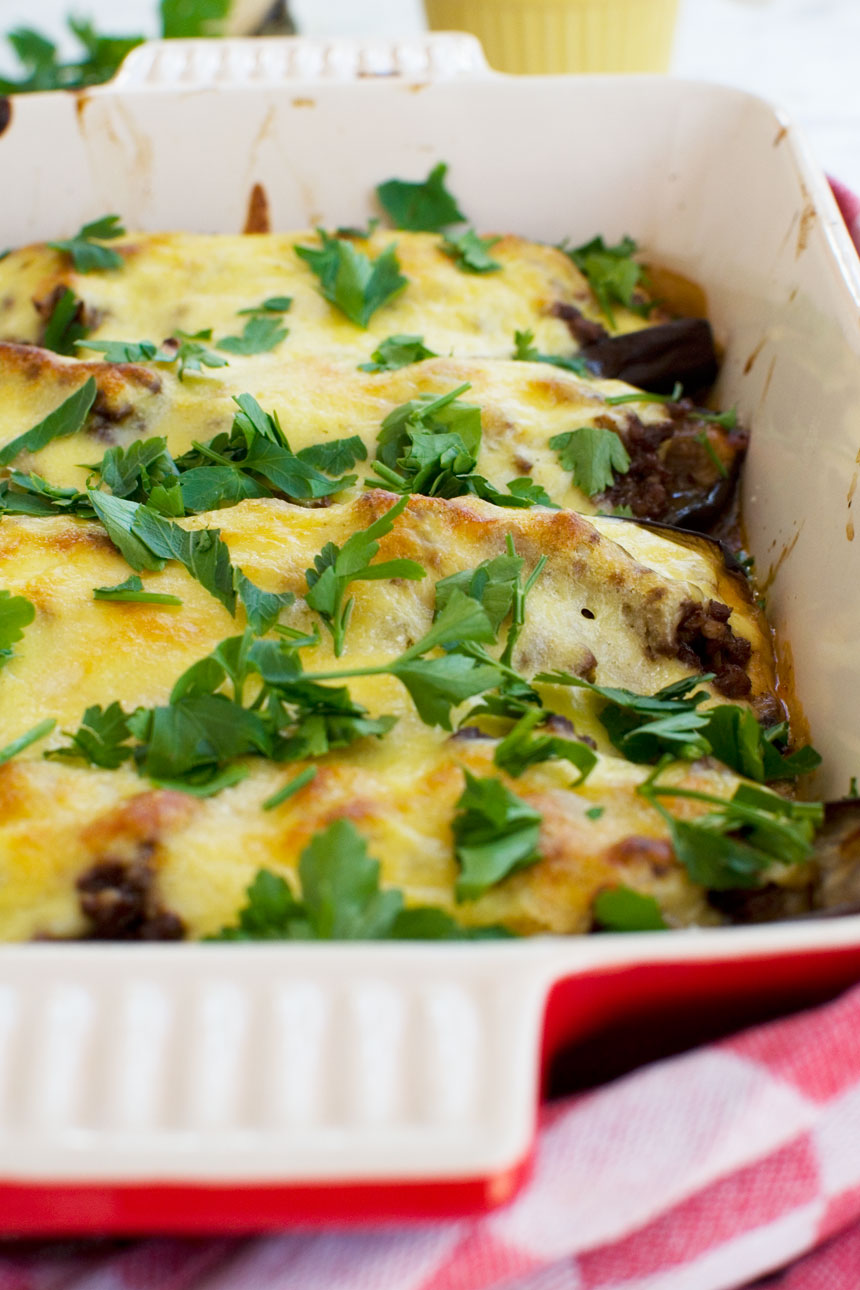 A close up of a baking dish of Greek stuffed eggplant (papoutsakia)