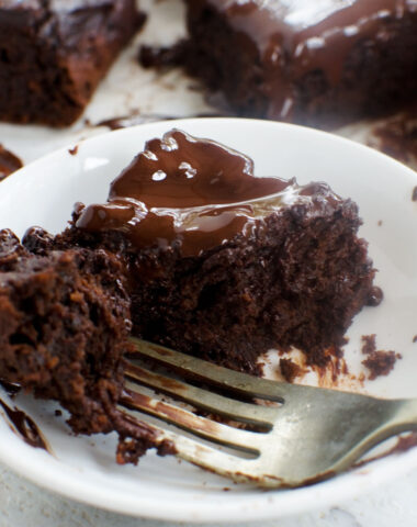 Someone eating a healthier chocolate avocado brownie with a fork