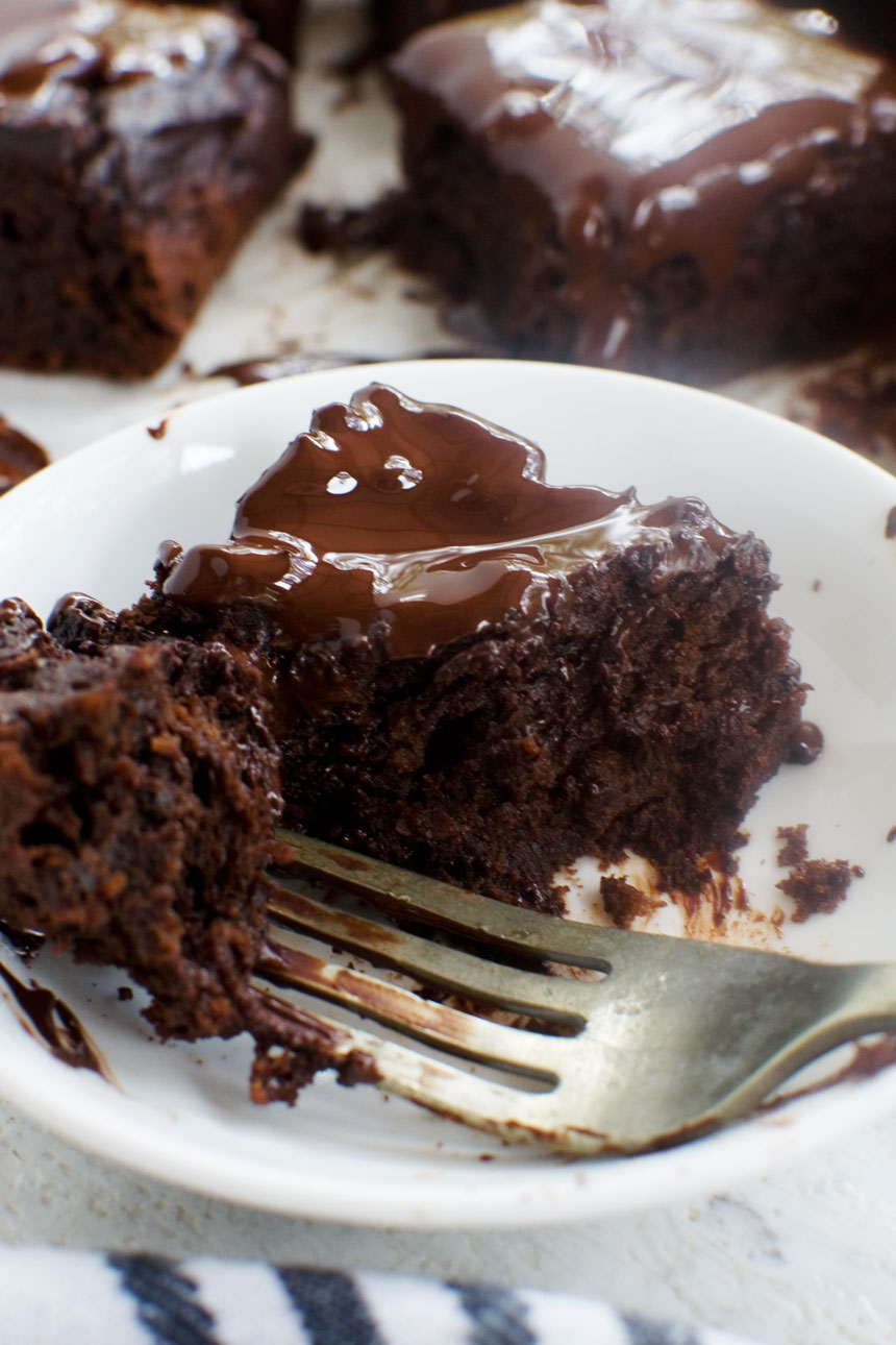 Someone eating a healthier chocolate avocado brownie with a fork