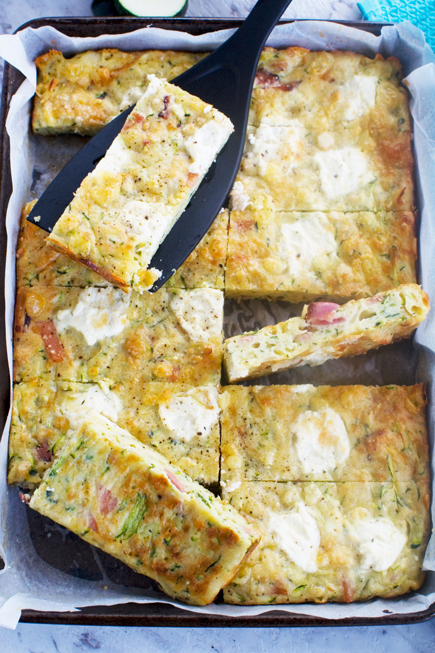 A baking tray of zucchini slice from above