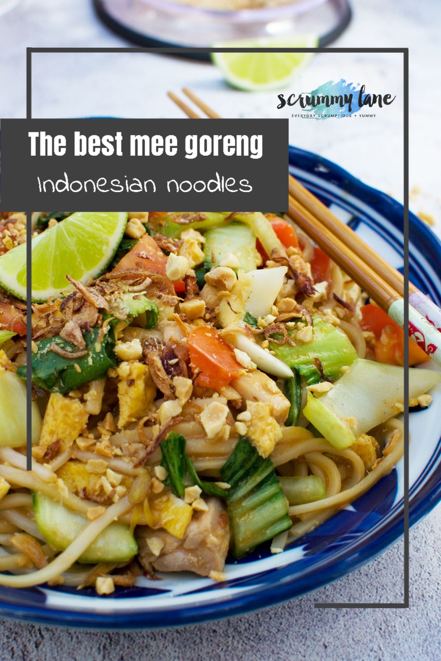 A close-up of a bowl of mee goreng basah or wet Indonesian noodles with title on for Pinterest