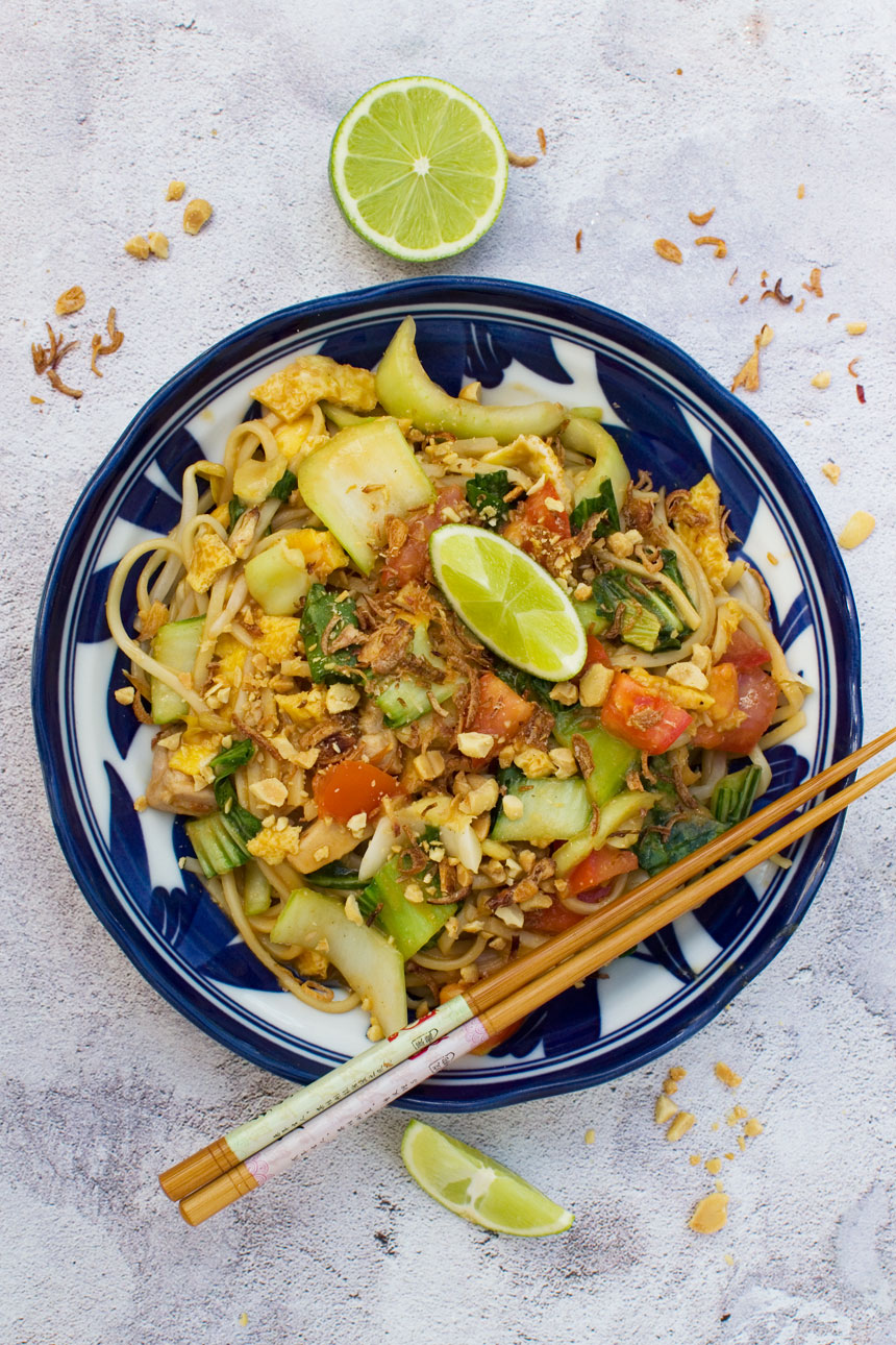A bowl of mee goreng basah or 'wet' Indonesian noodles taken from above with chopsticks