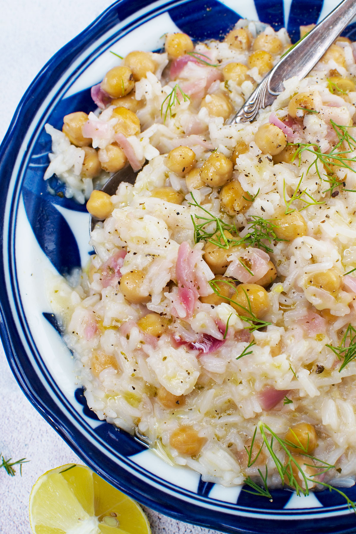 A closeup of a plate of 10-minute lemony Mediterranean rice with chickpeas