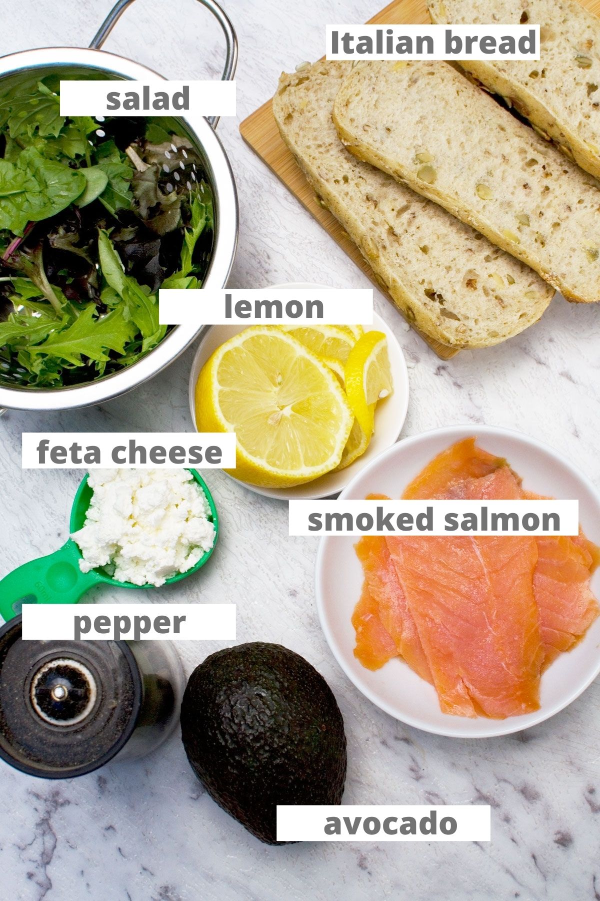 All the ingredients you need to make a smoked salmon bruschetta with avocado and feta