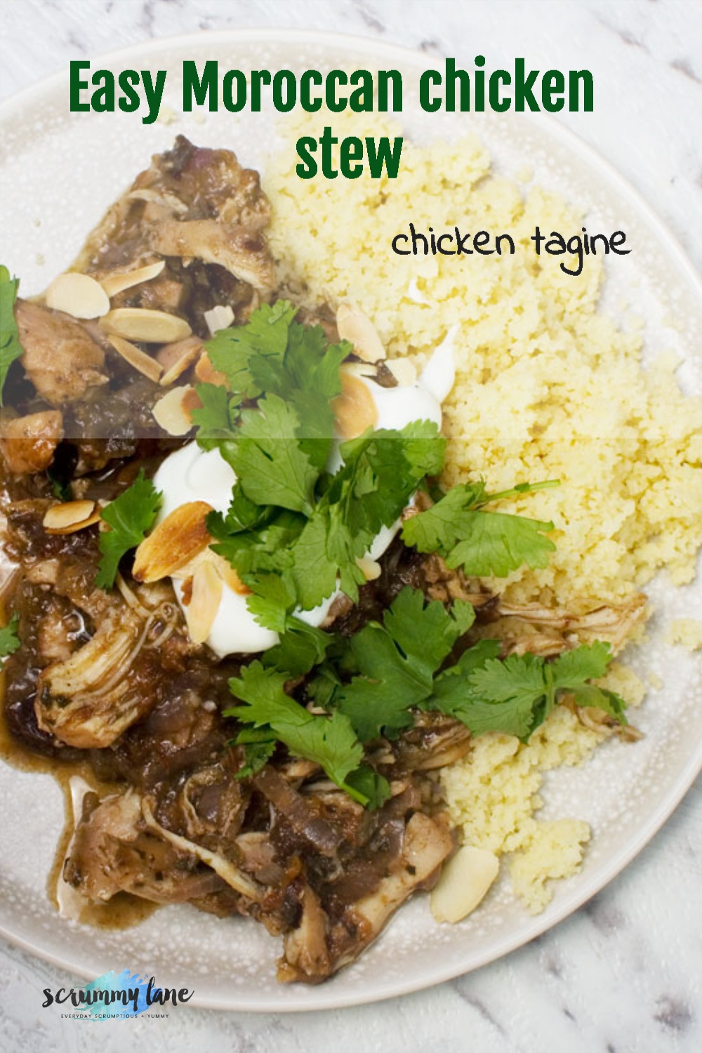 An overhead shot of a plate of Moroccan chicken stew or chicken tagine with couscous and garnished with coriander and yoghurt - with title on for Pinterest