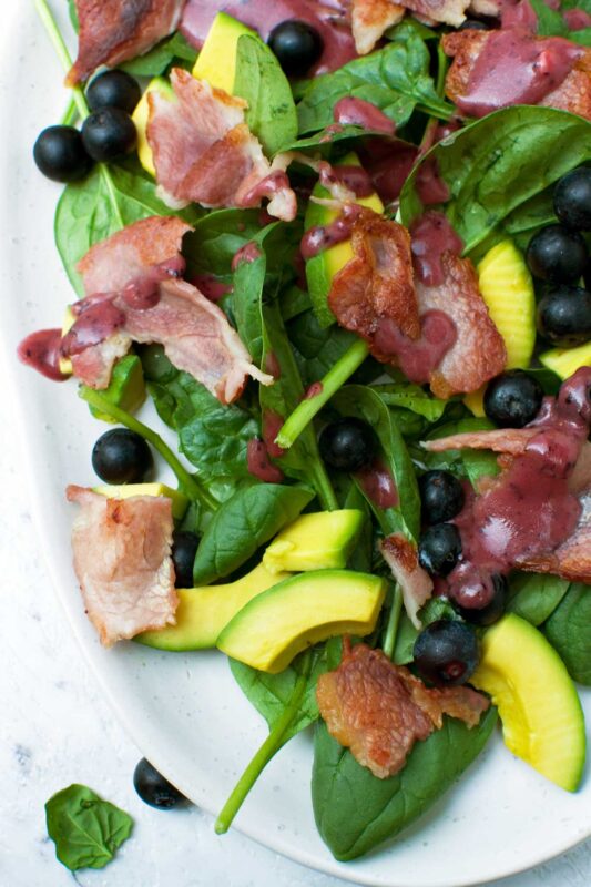 Spinach avocado salad with bacon and blueberries