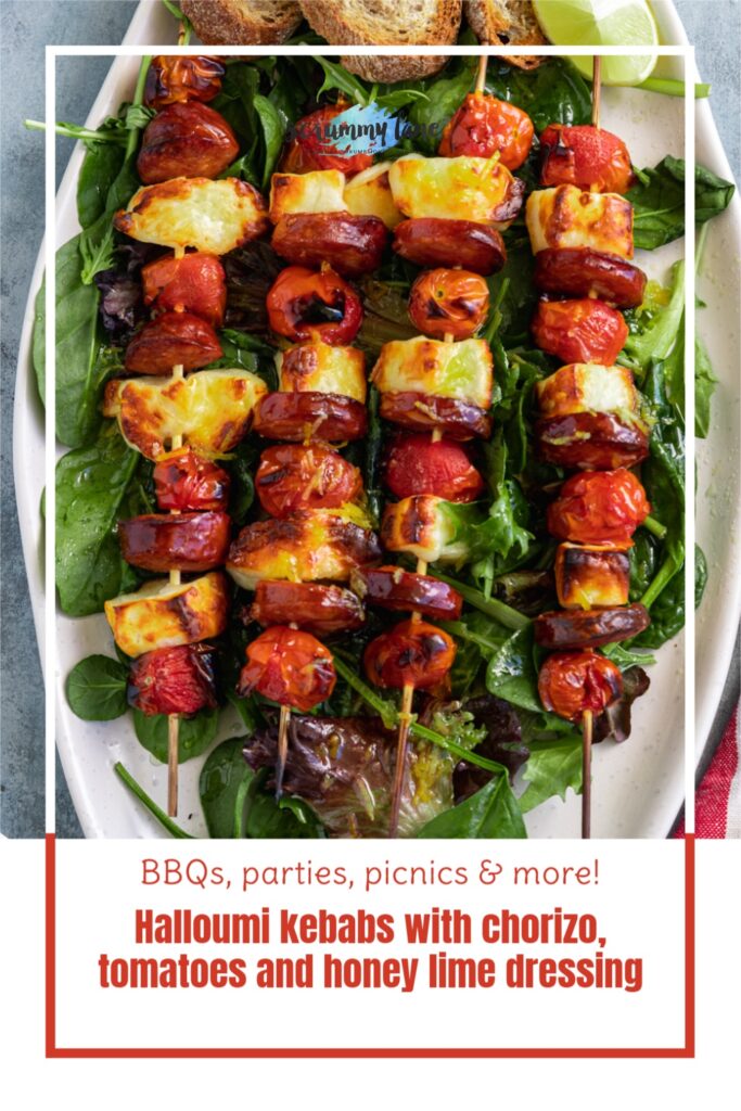 4 halloumi kebabs on a big white platter from above and with a title on it for Pinterest