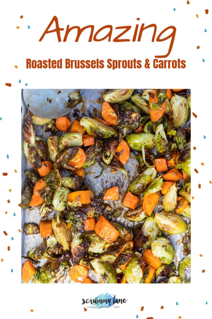 roasted brussels sprouts and carrots on a baking tray from above for Pinterest
