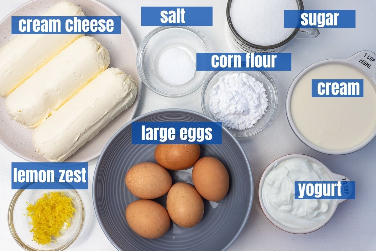 All 8 ingredients needed for a San Sebastian or burnt Basque cheesecake from above and labelled