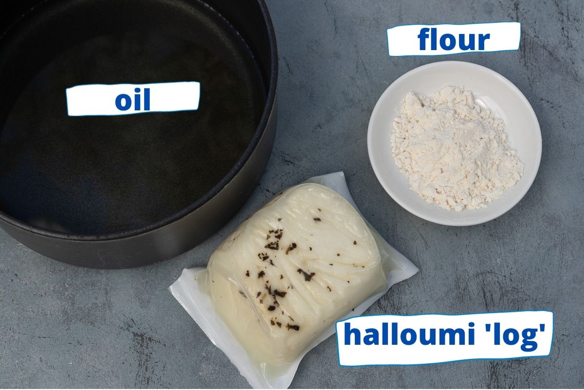 3 ingredients needed to make halloumi fries from above including oil, a halloumi log and flour 