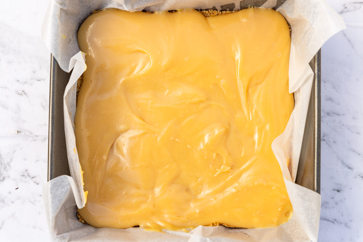 caramel slice in the pan from above with only the caramel layer on top