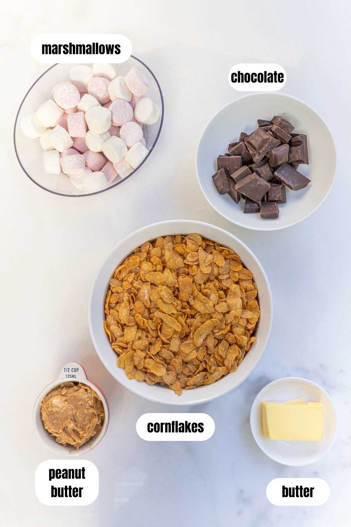 A collage of all the ingredients needed to make a 5-ingredient peanut butter cornflake bar recipe including cornflakes, peanut butter, marshmallows, butter, chocolate and marshmallows.