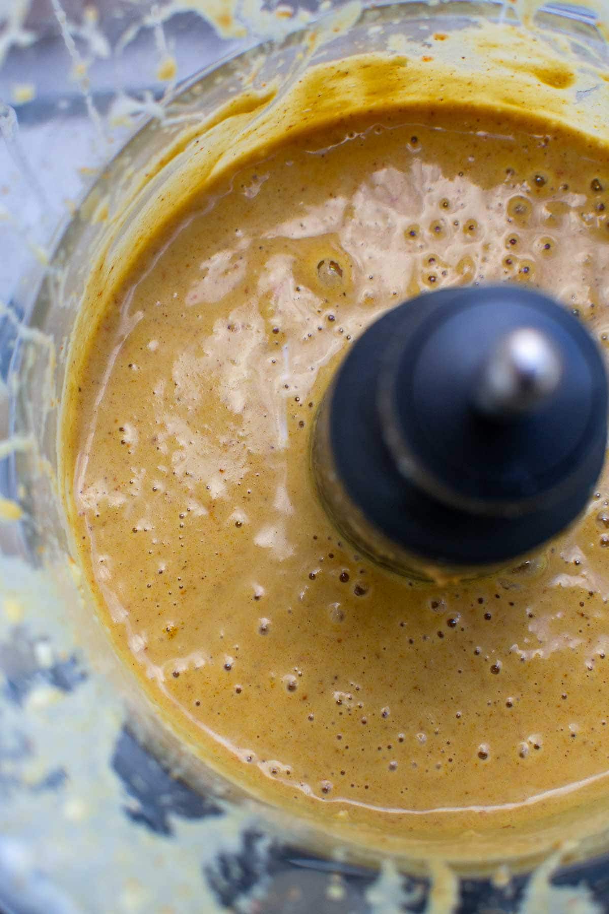 Overhead closeup shot of easy satay sauce for chicken in a food processor.