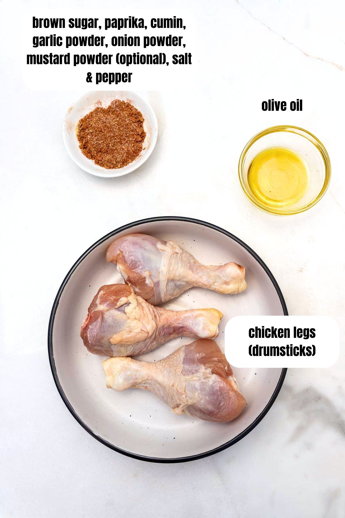 All the ingredients needed to make air fryer BBQ chicken legs including chicken legs, a mixture of seasoning, and olive oil.