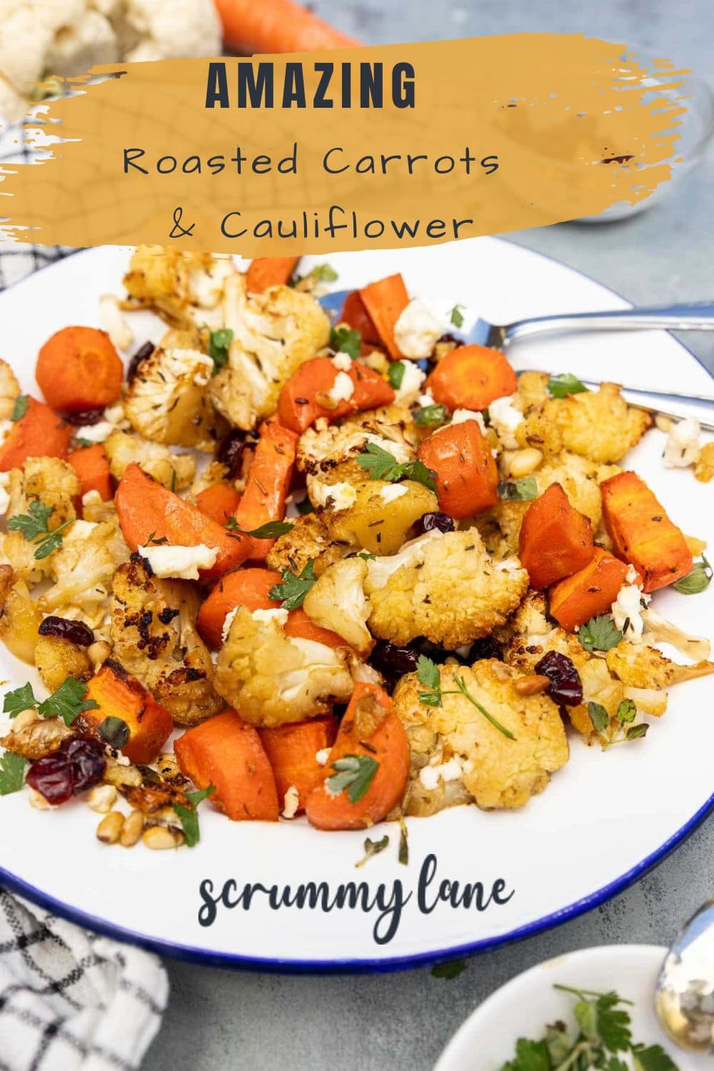 A pin for Pinterest showing a closeup of a white plate with roasted cauliflower and carrots and a title on it.
