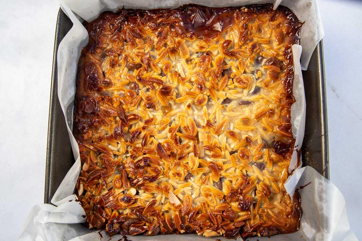 Overhead view of the just-cooked golden top of the bars in the pan.