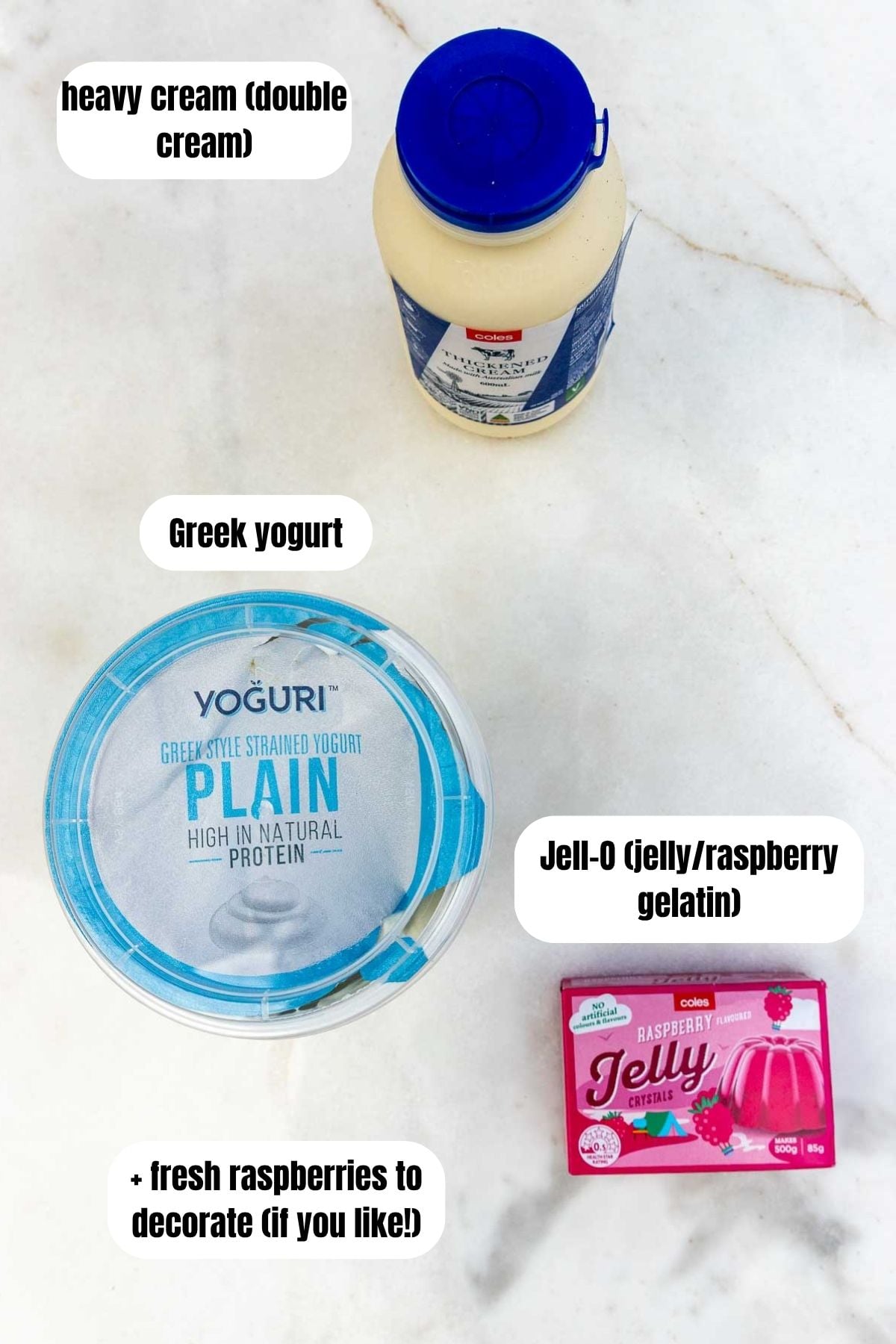 The ingredients in their packages to make the dessert, including Greek yogurt, heavy cream and Jell-O crystals, plus a note that you can add fresh raspberries too if you like.